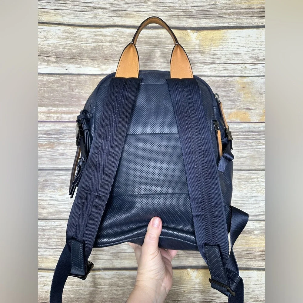Tumi Navy Perforated Leather Backpack with Tan Handles
